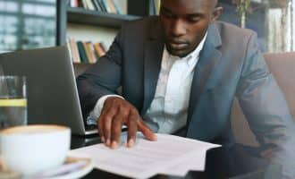 man reading contract featured image